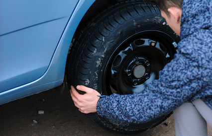 How to remove a tire from a rim