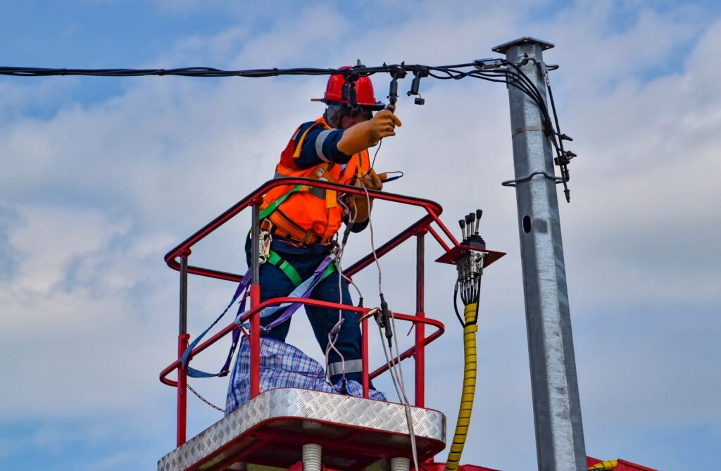 bucket truck with workman changing street light